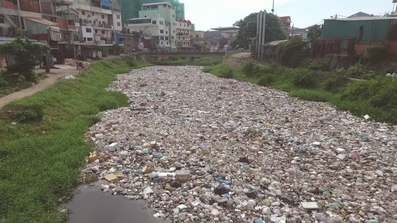 Aerial view of an extremely polluted river.