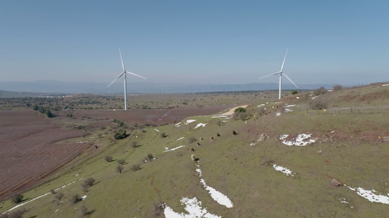 Aerial view of a valley with hills with wind turbines, Golan Heights, Israel.