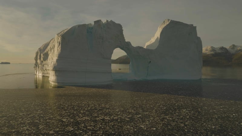 Aerial View of a big iceberg along the coast, Sermersooq, Greenland.