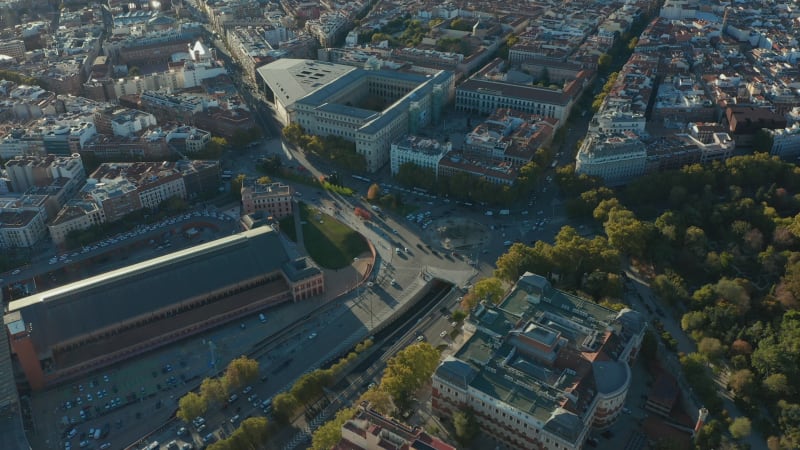 High angle footage of busy roads and big roundabout in front of Atocha train station. Aerial view of city.