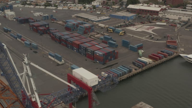 High angled view of industrial cranes in docks in New York City on cloudy day