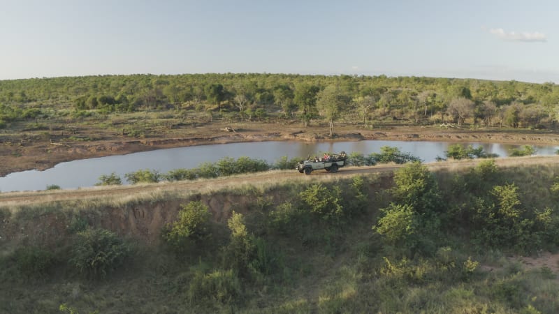 Aerial view of off-road safari along the river, Balule Nature Reserve.