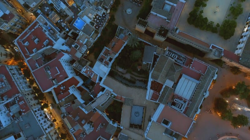 Rooftops and Streets of Seville at Night