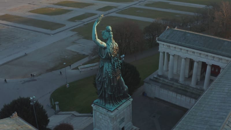 Famous Bavaria Statue overlooking Oktoberfest Theresienwiese Empty Wiesn Event Space in Munich, Germany, Aerial View from above