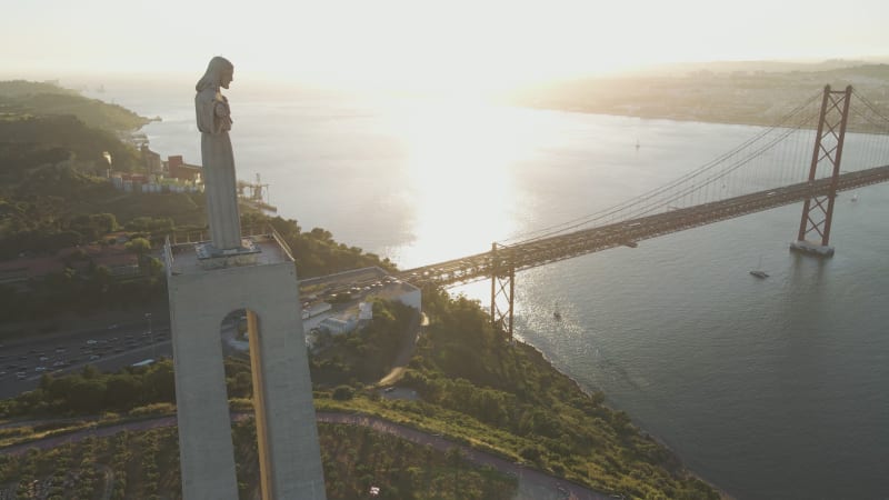 Aerial view of April 25th bridge and Cristo Rei, Almada, Lisbon, Portugal.