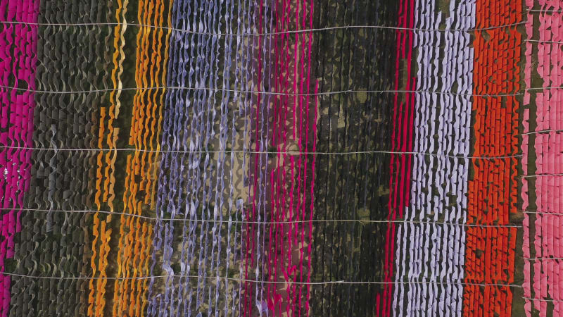 Aerial view of colourful fabric hanged in Narayanganj, Bangladesh.