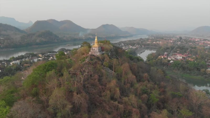 Aerial view orbiting Mount Phousi Luang Prabang, Laos