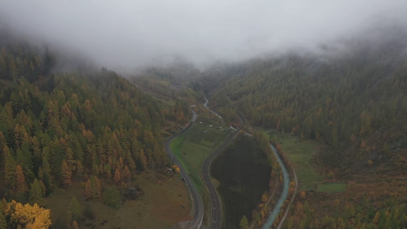 Aerial view of a waving road in countryside, Ardon, Switzerland.