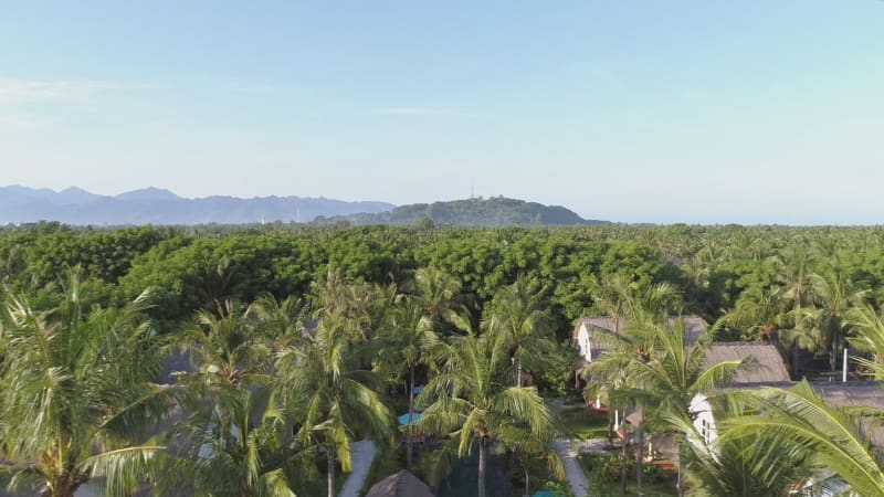 Aerial view of bungalows in a luxury resort.