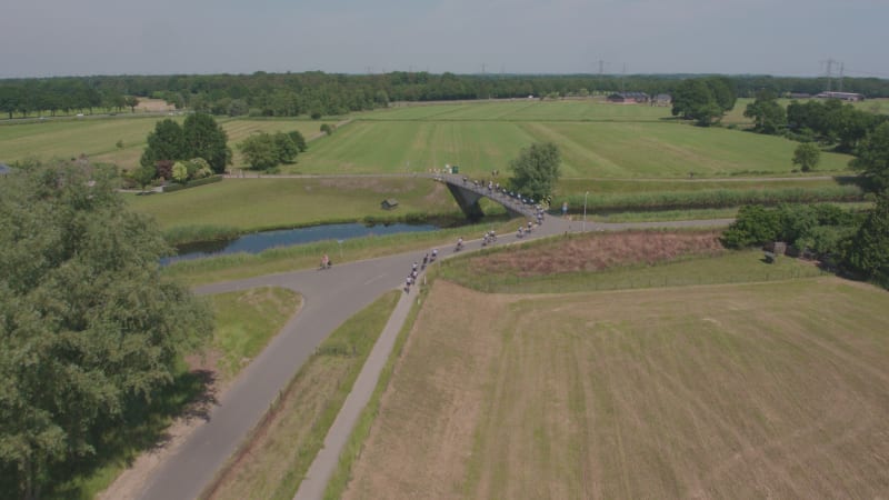 Cycling Team Crossing Bridge in Zwolle