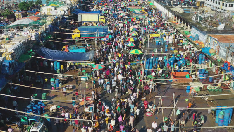 Aerial view of people at local fish market in Chittagong, Bangladesh.