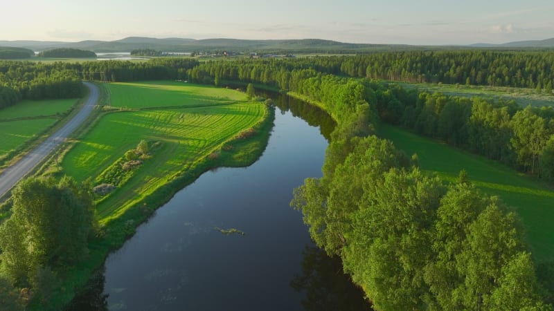 Aerial view of a river crossing the countryside, Overtornea, Sweden.