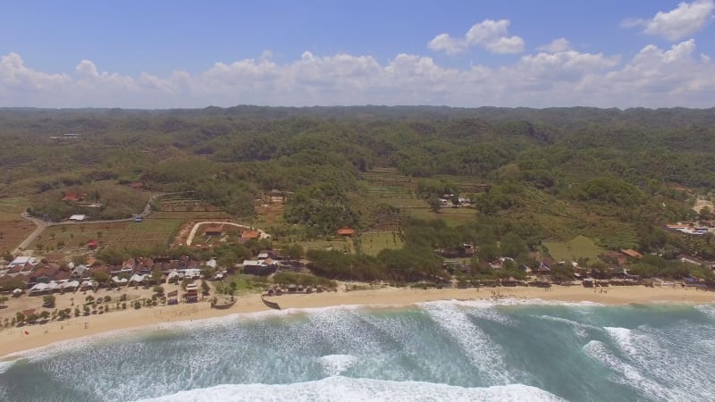 Aerial view of coastal village in the java sea.