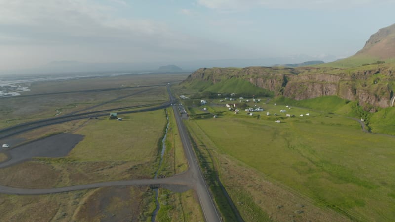 Aerial view icelandic highlands with mossy green cliffs. Drone view of grassland countryside near Seljalandsfoss in Iceland. Beauty on earth