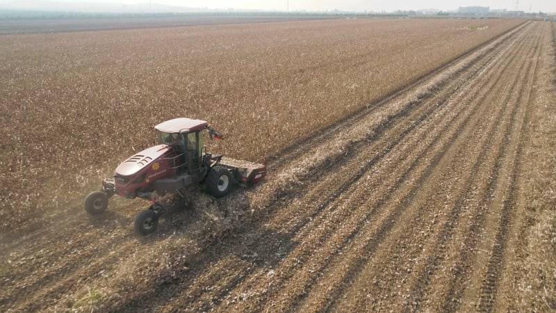 Aerial view of a tractor in a cotton field, Kibbutz, Israel.