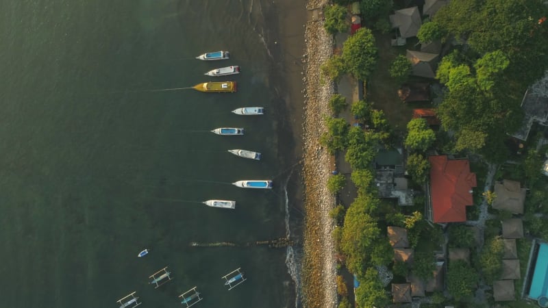 Aerial view at group of traditional boats anchored, Bali island.