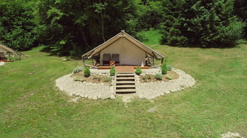 Tracking shot of a glamping tent in an eco camping.