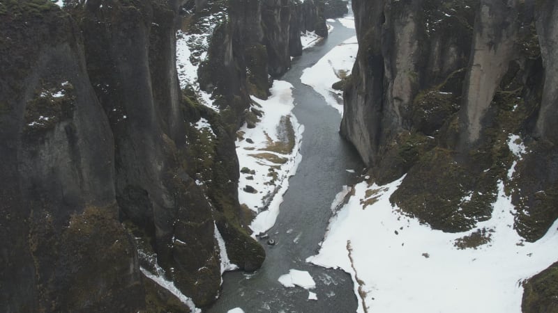 Aerial view of Fjardarargljufur canyon with river in wintertime, Iceland.