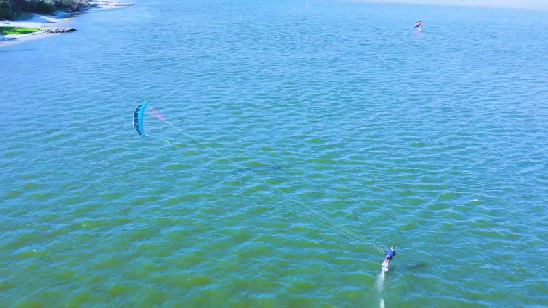 Aerial view of kitesurfing on a hydrofoil board, Queensland, Australia.