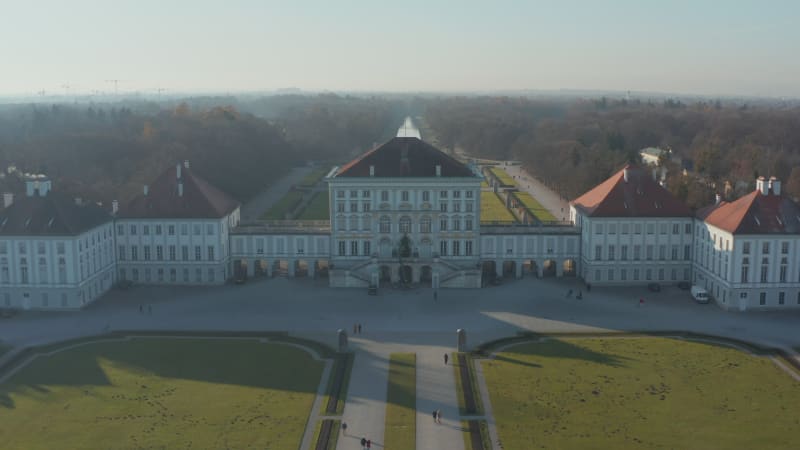 Amazing Royal Palace with Green Grass Lawn of Nymphenburg Palace Schloss Nymphenburg in Munich, Germany from Aerial Drone perspective