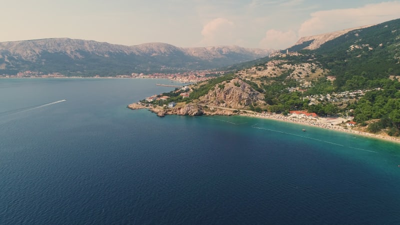 Aerial view of Baška coastal cityscape during the summer.