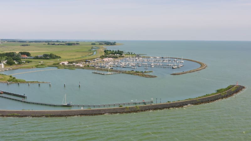 Ocean wall defenses protect the marina in Friesland, the Netherlands