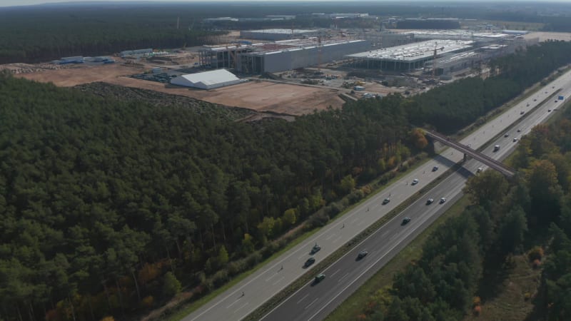 Big Factory Structure under construction in rural landscape of Germany near Berlin, Gigafactory by Tesla