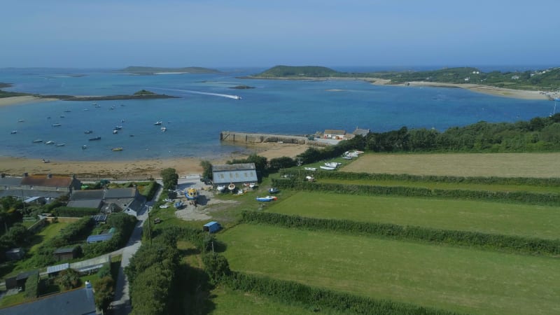 Green Countryside Next to a Port on the Isles of Scilly