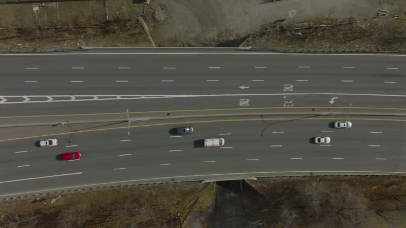 High angle footage of traffic on highway. Colourful vehicles driving in different lanes on wide road. Boston, USA