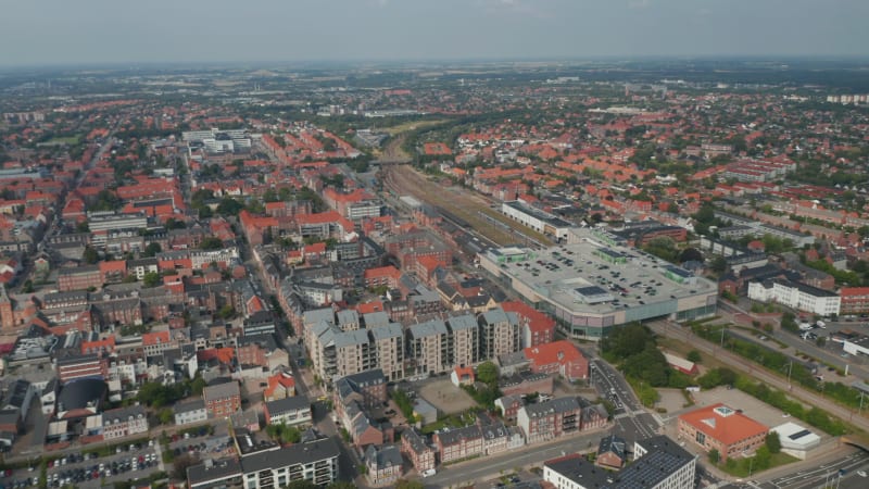 Aerial stunning view of Esbjerg, Denmark. Panning drone view over the characteristic brick buildings of one of the most important North Sea seaport