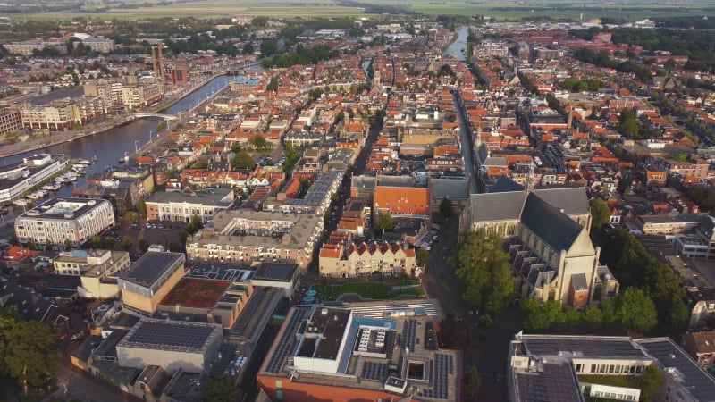 Grote or St. Laurentiuskerk and houses in Alkmaar City, North Holland Province, Netherlands.