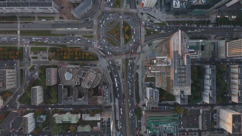 Aerial birds eye overhead top down view of heavy traffic around large roundabout in city. Warsaw, Poland