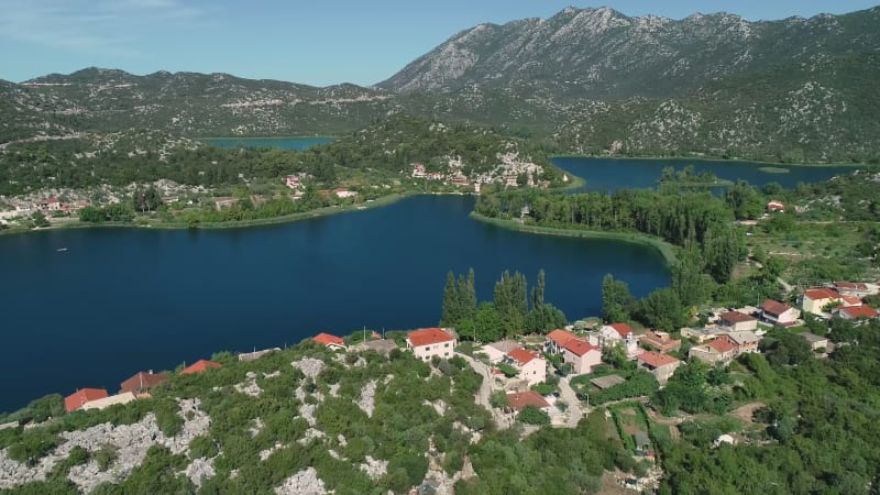 Aerial view of kitesurfing spot on the Neretva delta valley river.