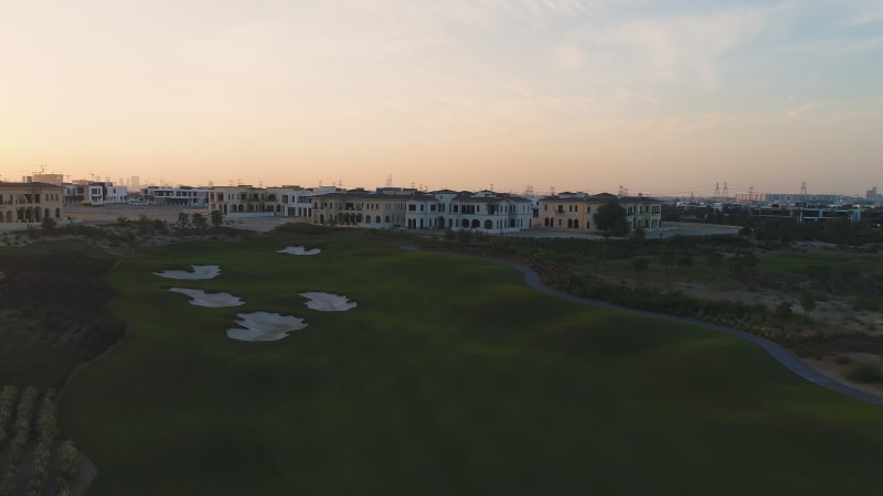 Aerial view of nightfall on a luxury residential neighborhood.