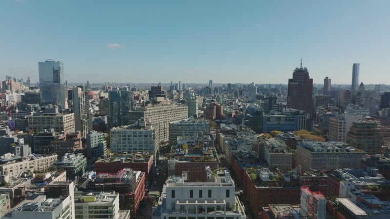 Slider of various buildings in urban neighbourhood. Town development in bright sunshine. Manhattan, New York City, USA