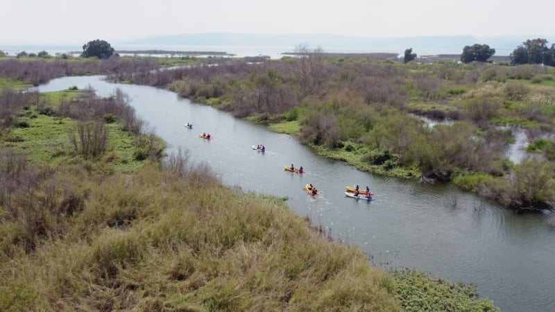 Aerial view of people with a kayak in the river, Negev region, Israel.