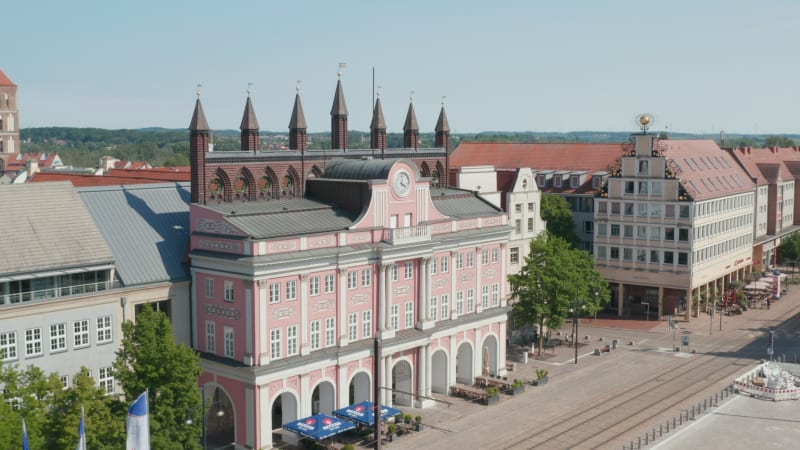 Slide and pan footage of city hall building on Neuer Markt square. Historic centre of hanseatic town