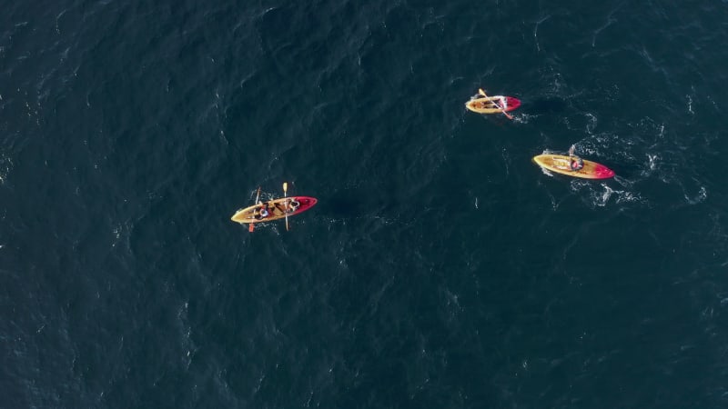 Aerial view of people doing kayak in Azores, Portugal.