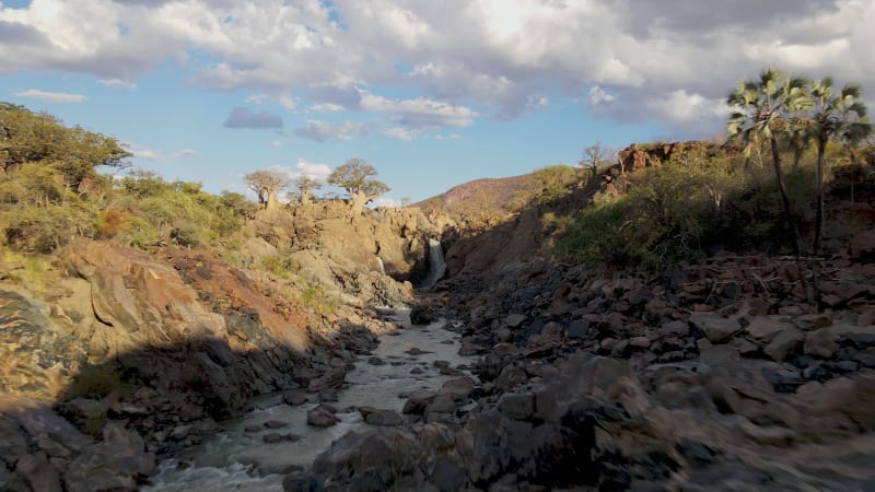 Aerial view of Epupa falls with baobabs green trees, Namibia.