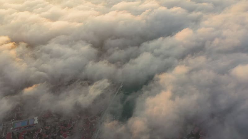 Aerial view above the clouds during the morning.