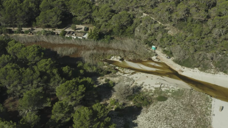 Polluted Beach Area in Mallorca with Cabin