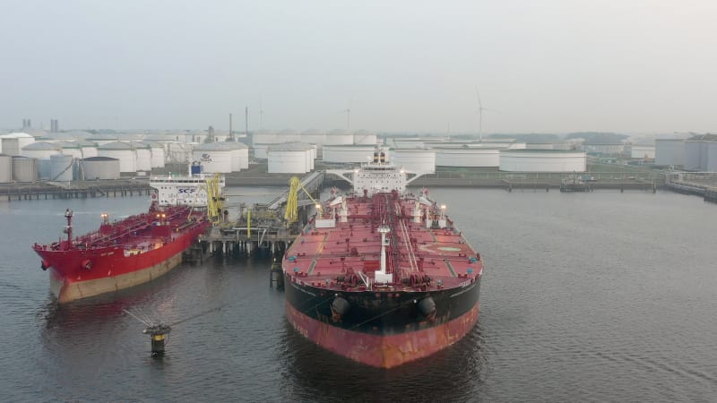 Supertanker Ship Docked in Rotterdam Offloading Goods and Cargo