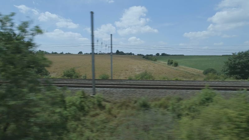 Low Level View of Two Passing Commuter Trains