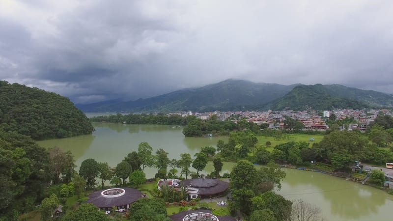 Aerial view of city on next to a river in Philippines.