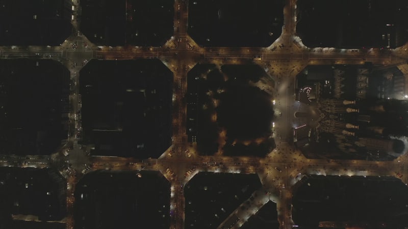 Barcelona Overhead Drone Shot of La Sagrada Familia at Night with Beautiful City Traffic lights