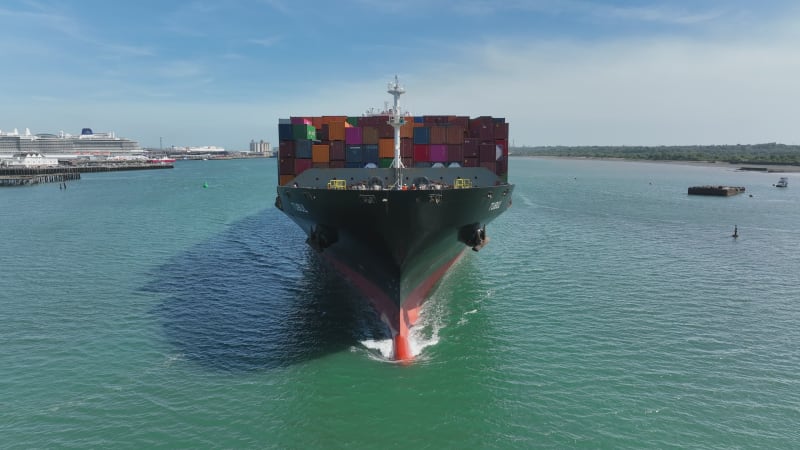 Container Ship Arriving Into Port Moving Cargo Internationally