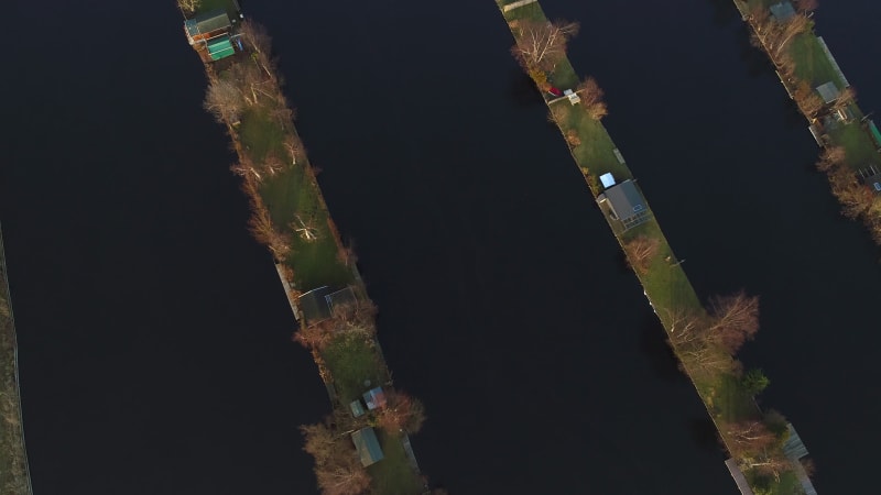 Aerial view of houses on the lake.