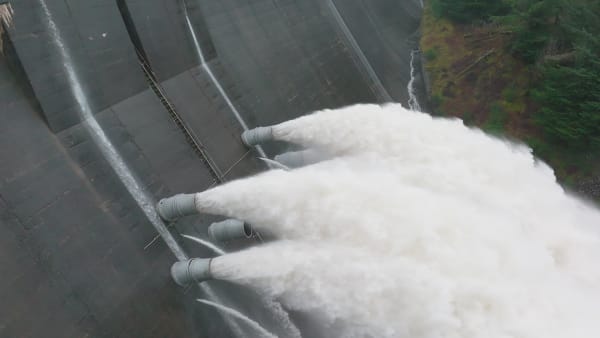 Water Pumped Through a Gravity Fed Hydroelectric Power Station Dam Slow Motion
