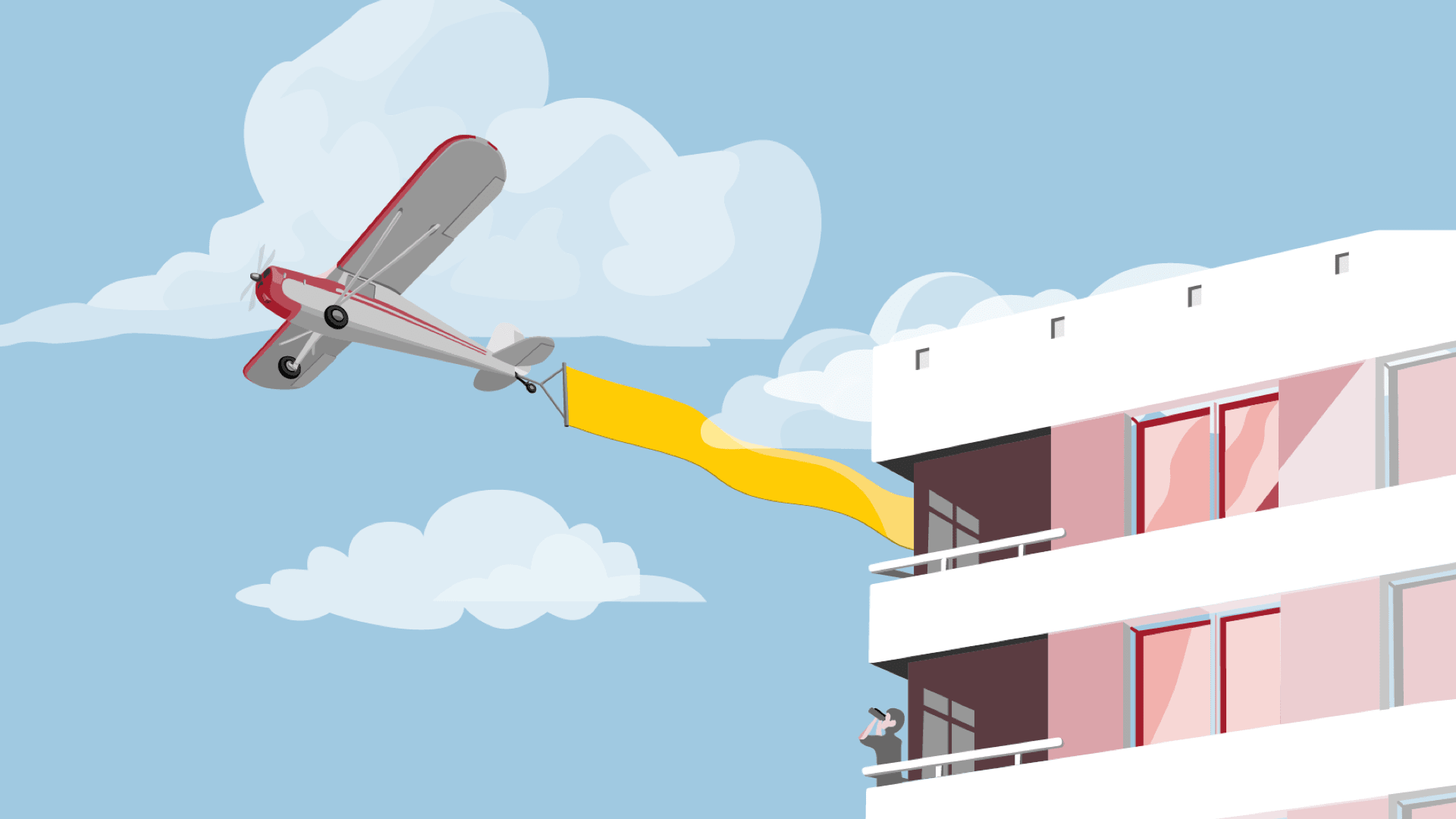 An aeroplane flies over a building with a person with a telescope at its side.