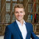 A headshot image of the author, Simon Fairbanks